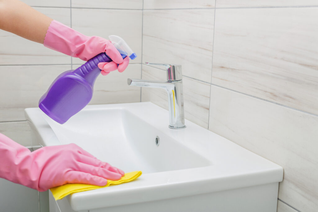 Cleaning scale build-up from bathroom sink